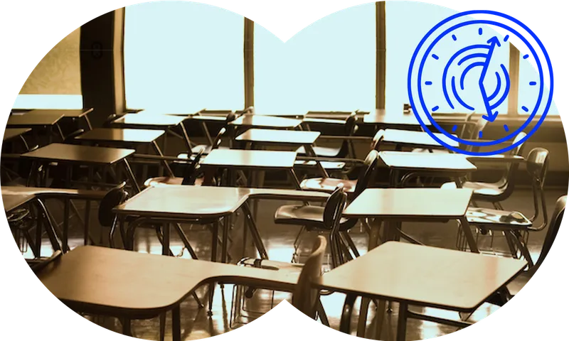 classroom empty with alarm clock floating and slightly odd eerie colours, it's desaturated