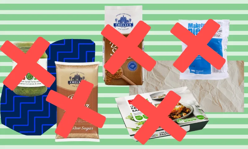 a green striped background with different packets of food that have large red crosses over them