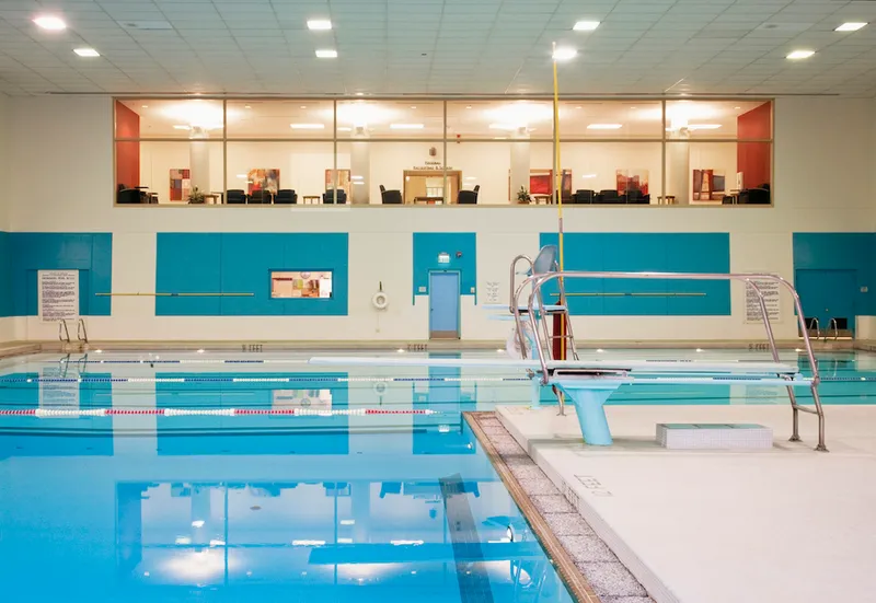 Room overlooking indoor swimming pool