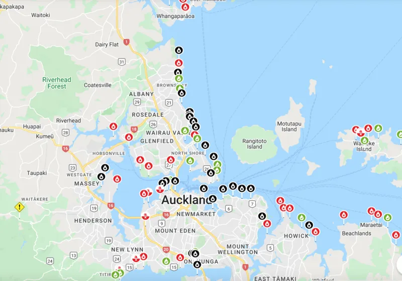 a screenshot showing a map of Auckland with black marks on most of the beaches map of the Auckland region with