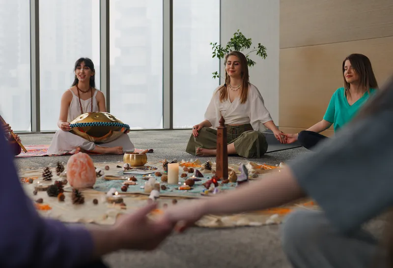 Performers and group of people joining music and sound therapy session