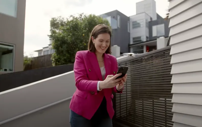 Brooke van Velden looking absolutely stoked to finish her stint at a delivery driver, 15 September 2024. (Image: Still from Act promotional video).