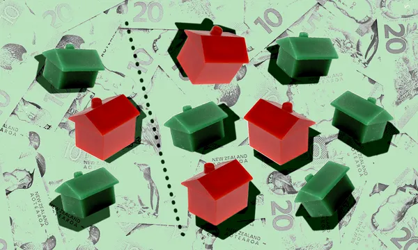 Monopoly houses and hotels against a backdrop of cash money
