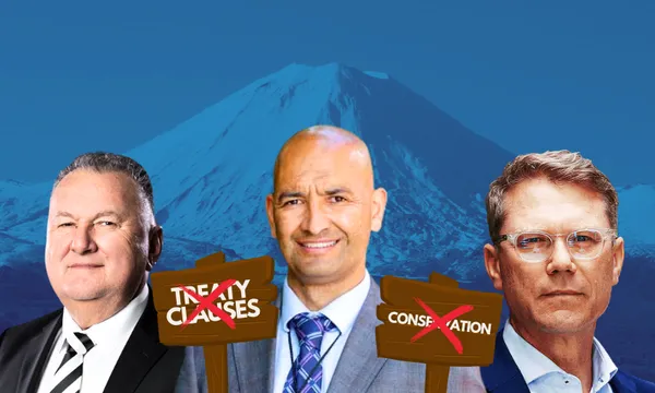 Shane Jones, Tama Potaka, and Paul Goldsmith in suits stand in front of Mount Ruapehu. Two signs with red crosses read "Treaty Clauses" and "Conservation." The background mountain is partially obscured by the signage.