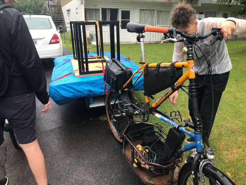 A queen mattress loaded onto Lawton's bike trailer.