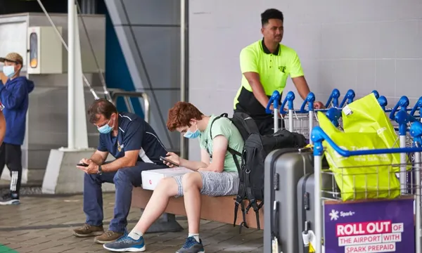 passengers wearing face masks auckland airport getty