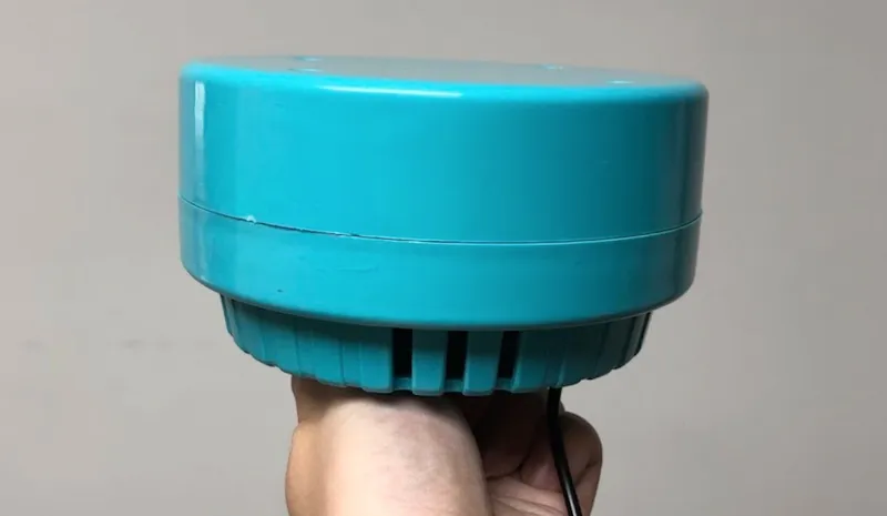 A ceiling vibrator, colour green.