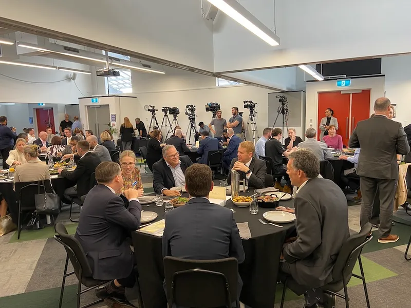 Chris Hipkins eats a hearty lunch with minister Michael Wood and others