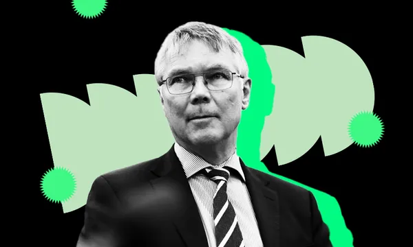 Revenue Minister David Parker in black and white, wearing a suit. There are green bubbles in the background