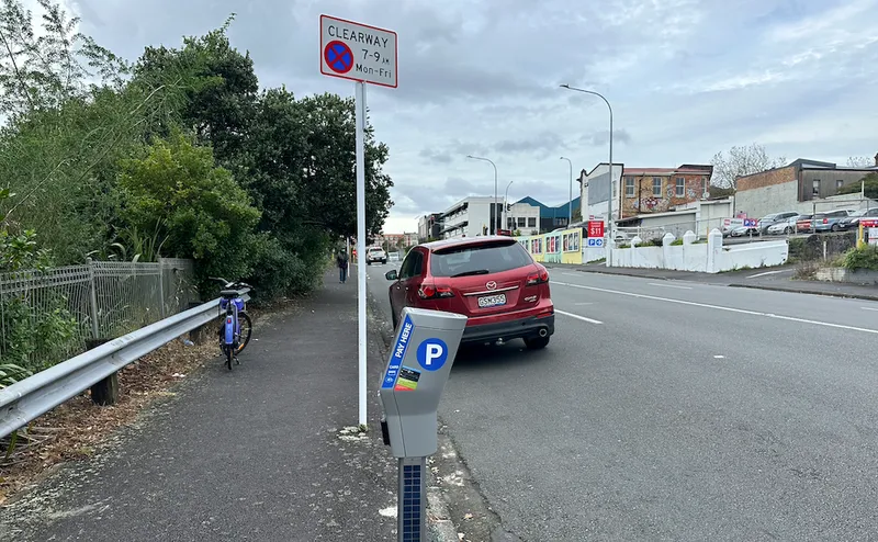 A lone car sits where many used to be.