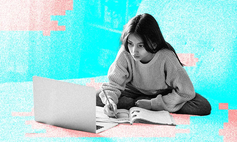 girl with a laptop and notebook