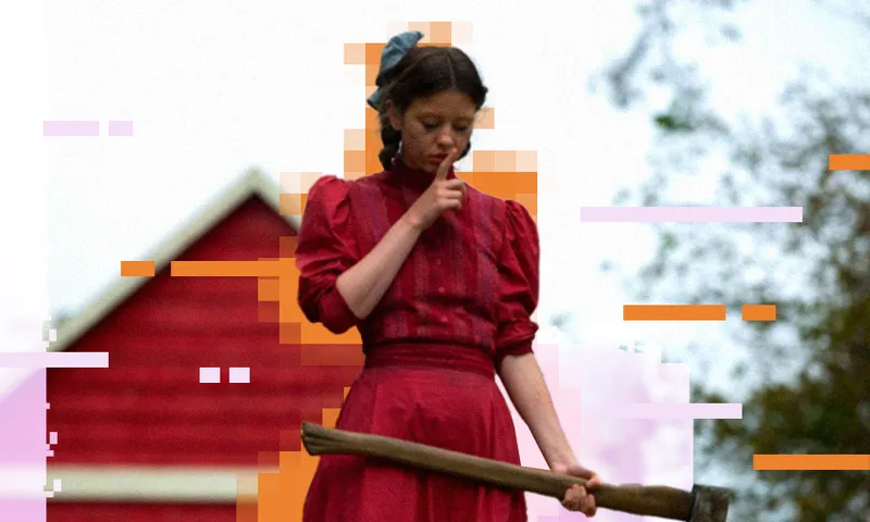 Mia Goth brandishes an axe in the film Pearl.