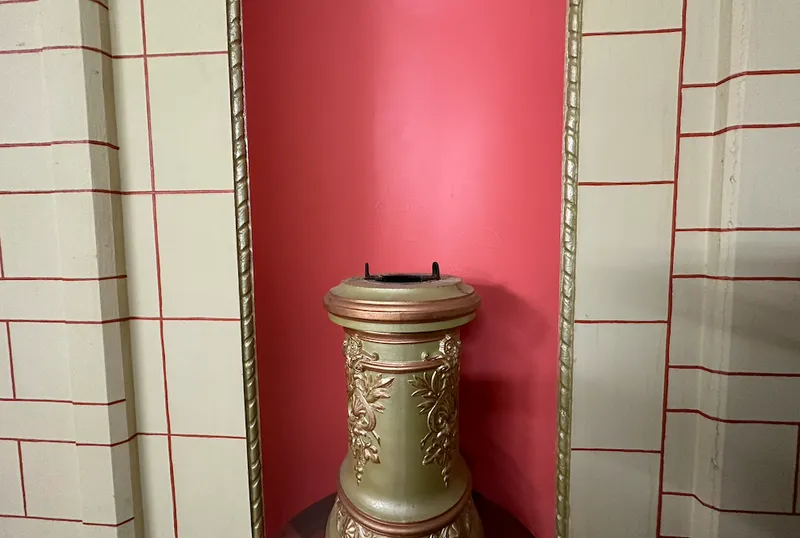 A plinth in the St James is missing its cherub.