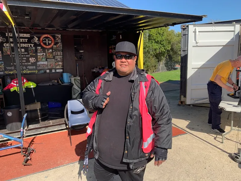 Mr T standing outside the Māngere bike hub.