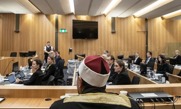 Masjid An-Nur (Al Noor Mosque) imam Gamal Fouda looks onto the courtroom.