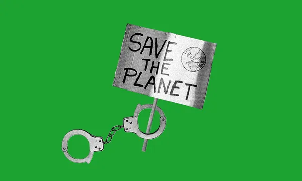 A save the planet protest sign with handcuffs around it, against a green background