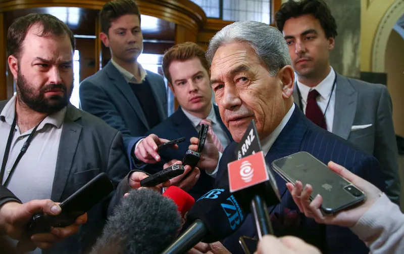 Winston Peters at parliament with reporters
