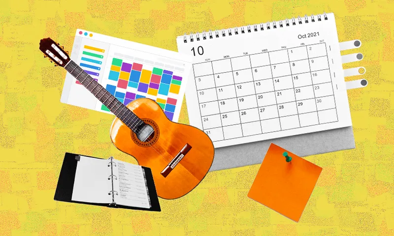 sticky notes, a guitar and a calendar