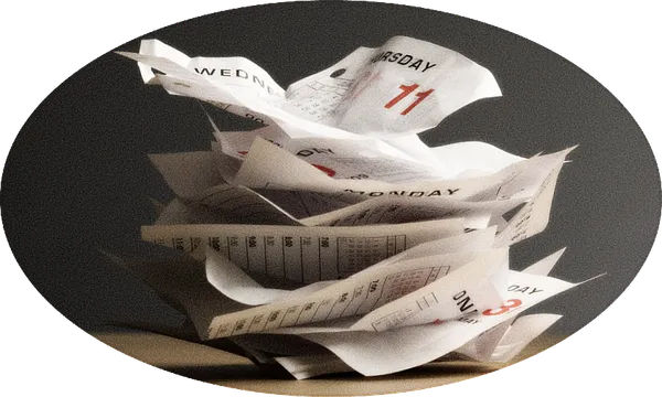 a pile of calendare dates sort of crumpled looking