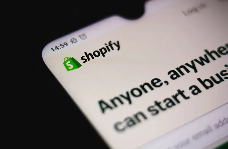 In this photo illustration a Shopify company website seen