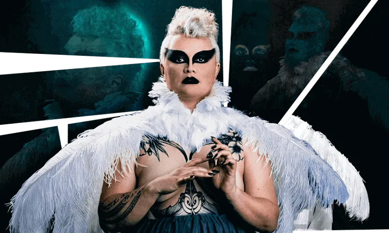 Photograph of a woman in magnificent creepy bird costume, staring straight to camera.