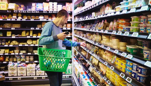 Man shopping in supermarket