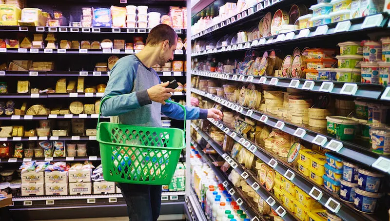 Man shopping in supermarket