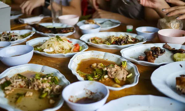 Leftover food after meal at restaurant. Food waste is a huge and growing environmental, financial, and social problem globally.