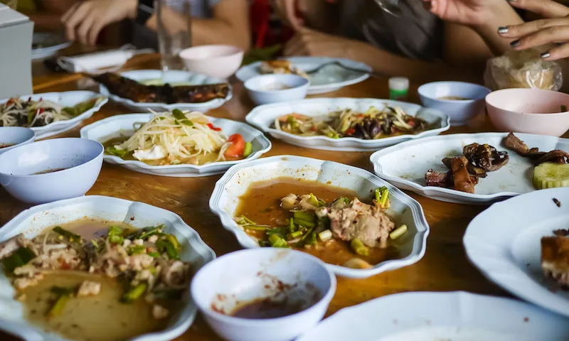 Leftover food after meal at restaurant. Food waste is a huge and growing environmental, financial, and social problem globally.
