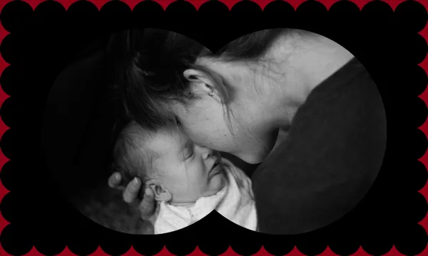 Black and white photo of mother and baby