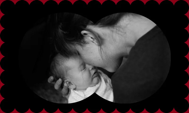 Black and white photo of mother and baby