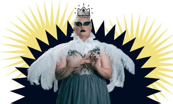Photograph of woman wearing magnificent costume of white feathers and grey gauze. Dramatic makeup.
