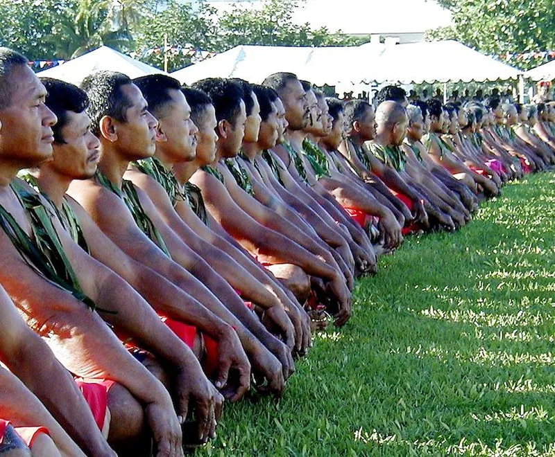 Dozens of Samoa's matais or chiefs sit as they par