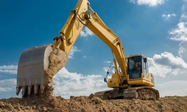 excavator blue sky heavy machine construction site