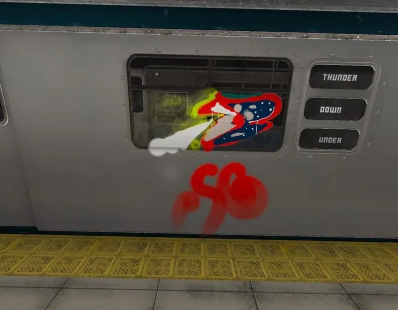 Some random red and black squiggles on a fake subway car. it looks bad!