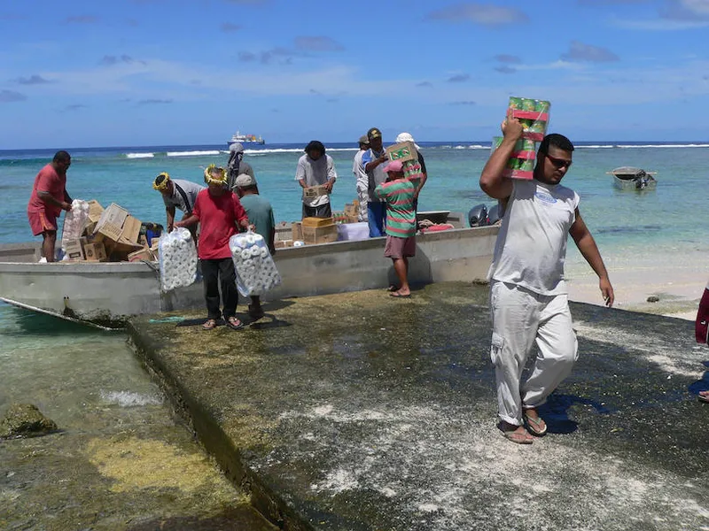 Undated photo shows villagers unloading