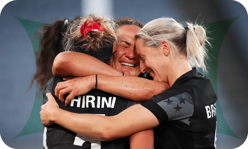 Compelling photograph of three women embracing and crying with joy.