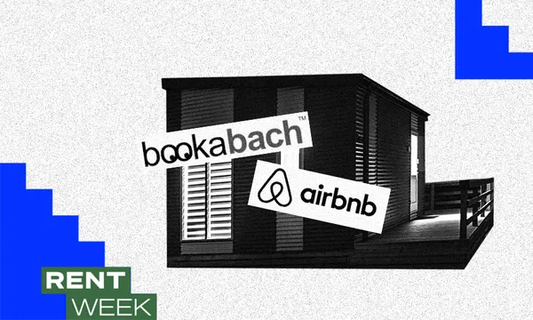 black and white house with airbnb logo on top