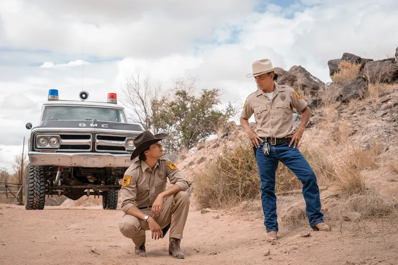 Zahn McClarnon as Joe Leaphorn and Kiowa Gordon as Jim Chee - Dark Winds _ Season 1, Episode 4 - Photo Credit: Michae...