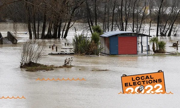 a local elections sign deluged in water