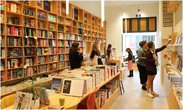 Interior of a bookstore, with customers