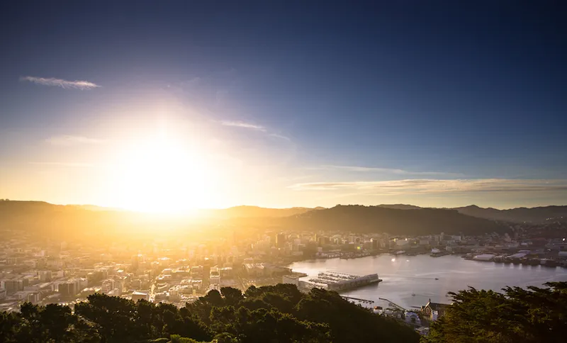 Sun Hitting the Horizon Over Wellington Harbour