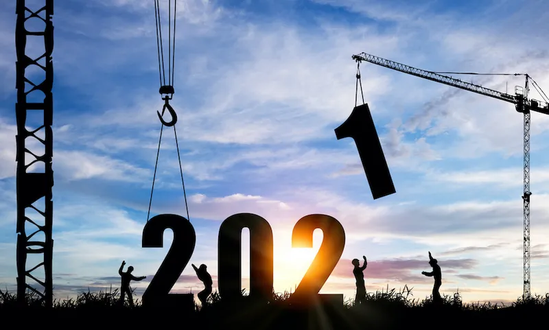 Silhouette of construction worker with crane under prepare welcome 2021 new year party and change new business.