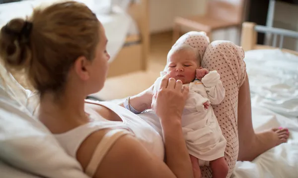 Mother with her newborn baby in the hospital