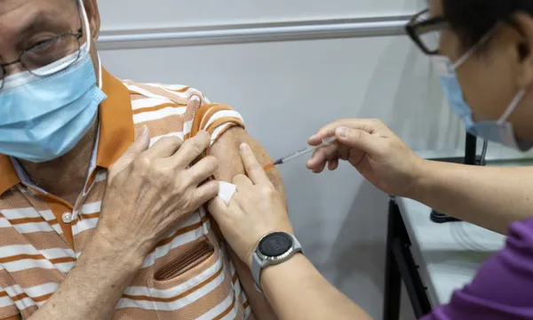 pfizer vaccine being administered in singapore getty
