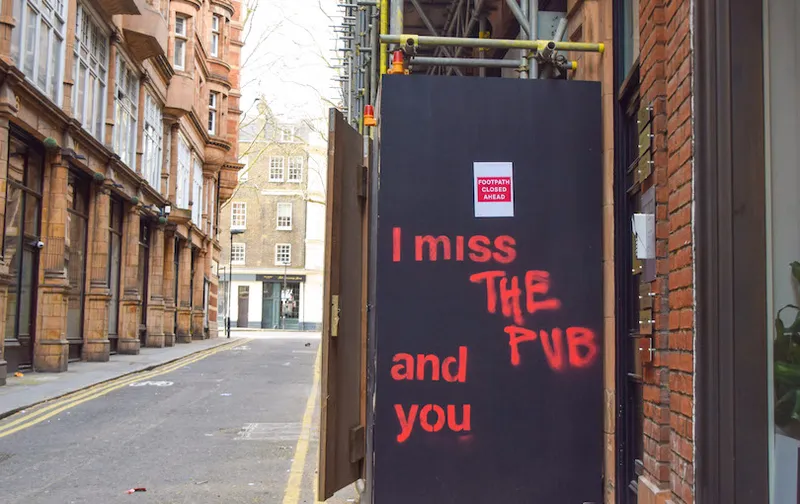 'I Miss The Pub And You' graffiti in London's West End. Pubs