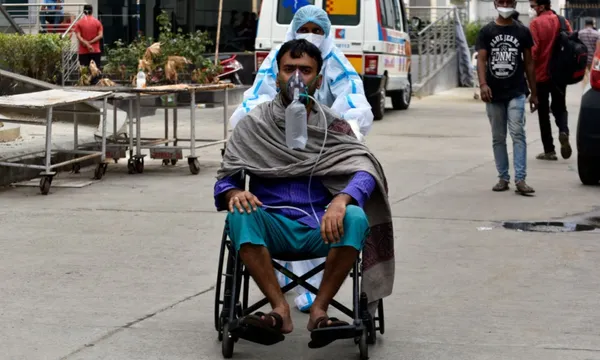 man on oxygen in Kolkota covid india getty
