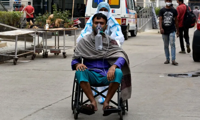 man on oxygen in Kolkota covid india getty