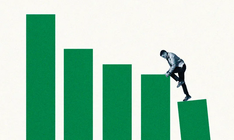 Young man climbing up on green bar graphs