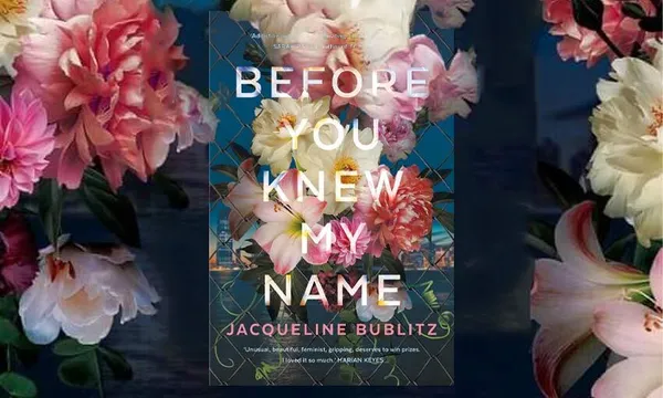 A book cover bursting with blowsy roses and peonies
